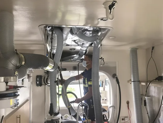 Marblehead Air Duct Cleaning specialist performing precise mobile home duct cleaning in Marblehead