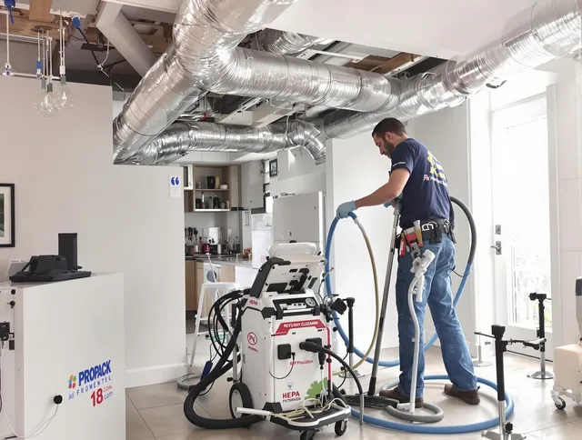 Marblehead Air Duct Cleaning technician performing advanced pure duct cleaning with specialized equipment in Marblehead